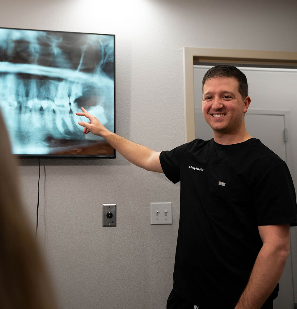 patient going over dental procedure information