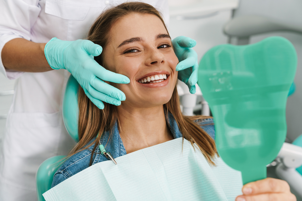 Dentist in consultation with a patient in a modern dental office