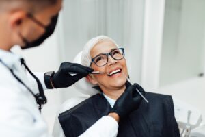 Dentist explaining a treatment plan to a patient in a modern dental office